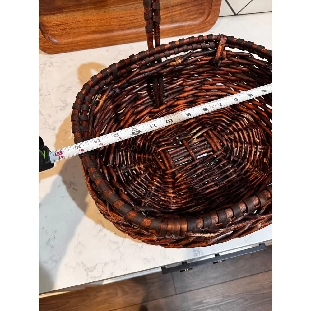 dark stained willow basket rustic handwoven texture sturdy center handle vintage